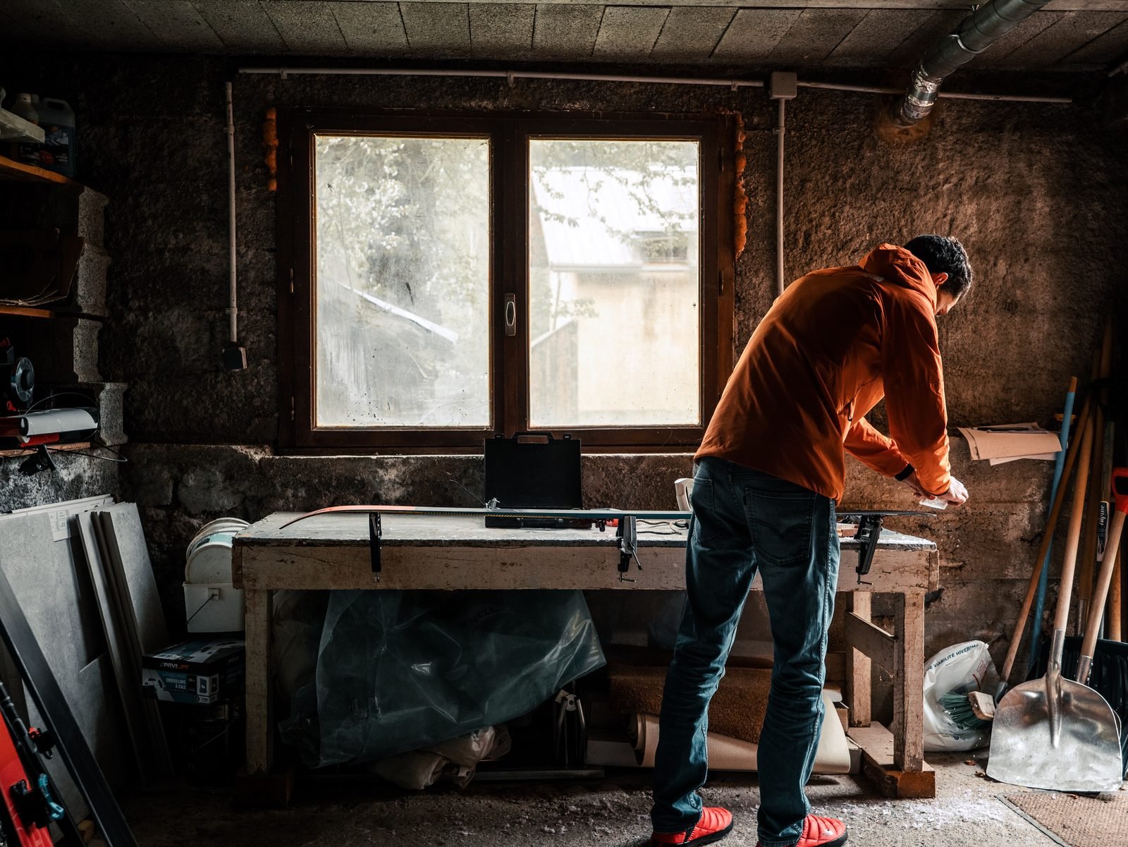 Packing in a mountain hut before dawn