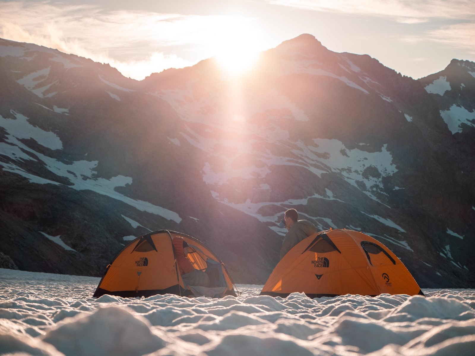 Tents on the glacier at sunset